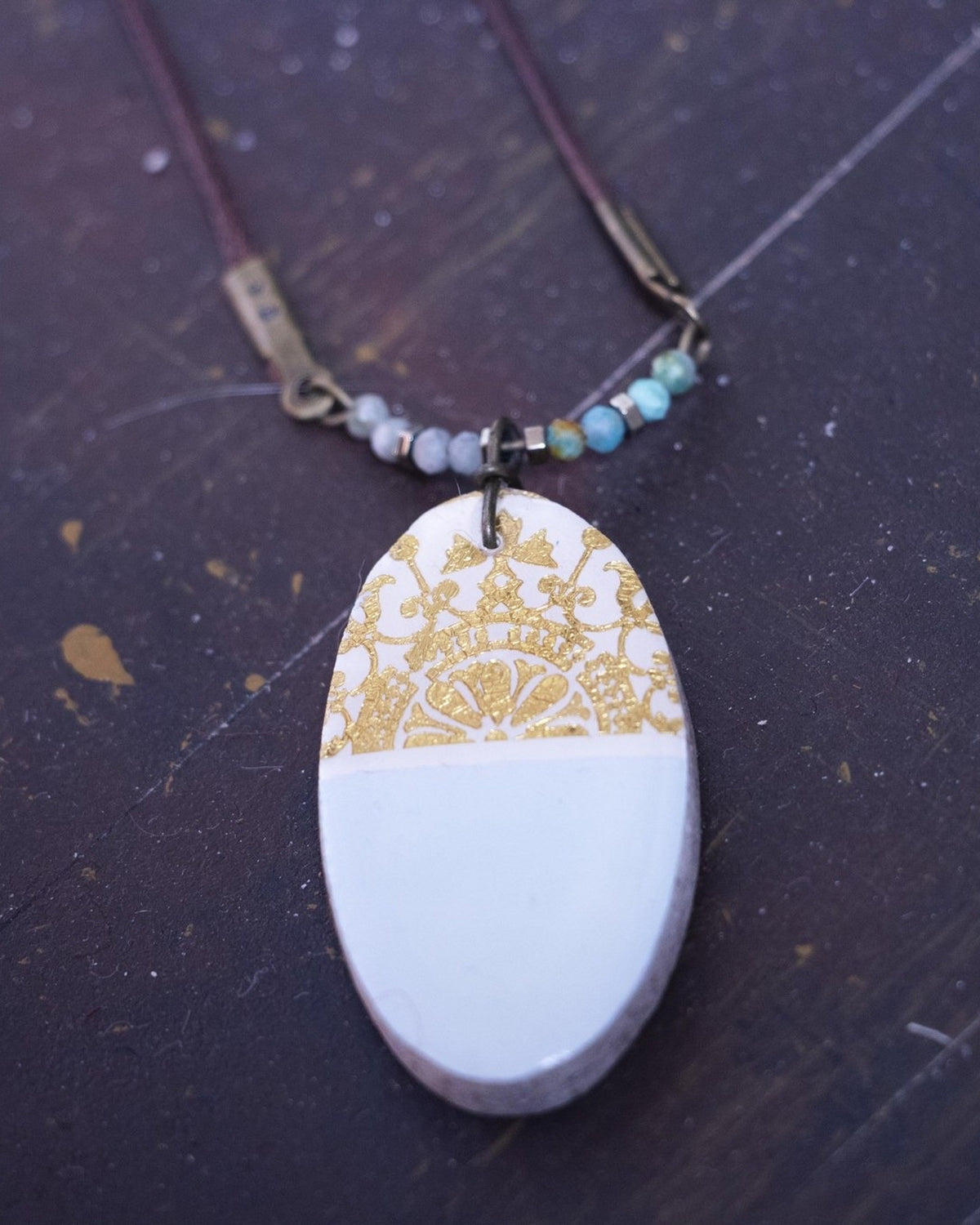 Tolu Oval Tile Necklace – lifestyle, hand-cut air-dried Persian tile