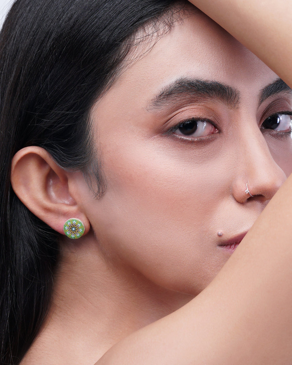 Zomorrod Round Tile Stud Earrings – worn, lifestyle, hand-cut air-dried Persian tile